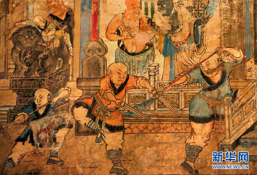 少林寺白衣殿內(nèi)的墻上表現(xiàn)少林武僧習(xí)武練拳的壁畫(局部,2005年9月15日攝)。
